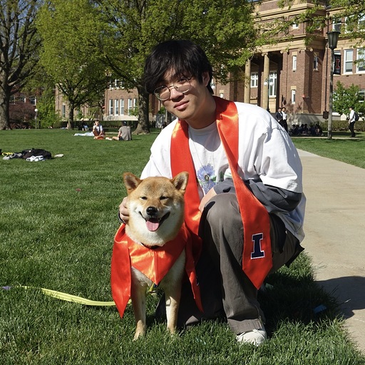 Ri-Zhao (Roger) Qiu with a Shiba Inu